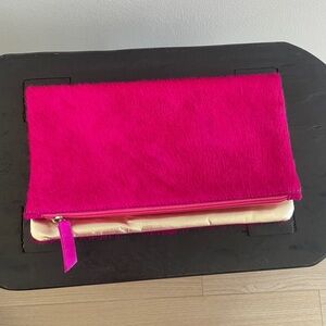 Hot pink and gold clutch